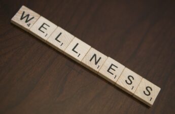 Scrabble letters that read "Wellness"